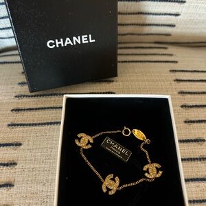 CHANEL Gold Bracelet with Iconic Emblem